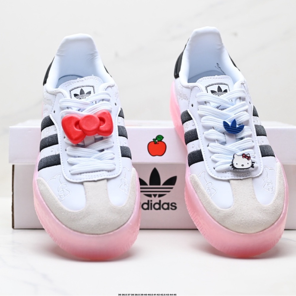 Adidas White Sneakers with Pink Soles and Black Stripes